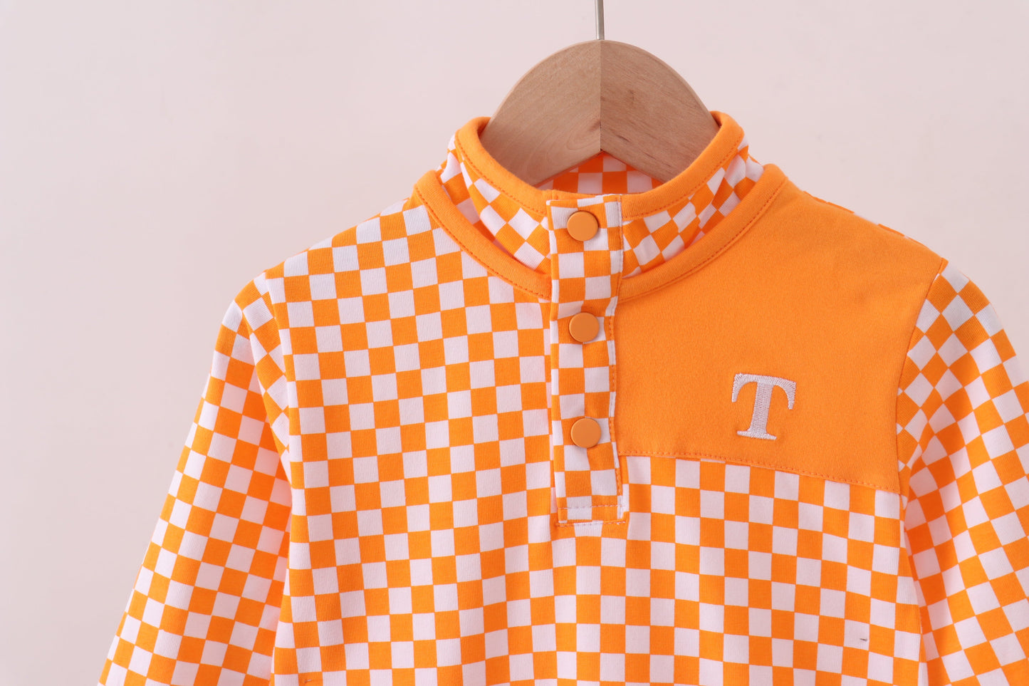 Orange Tennessee checkered pullover ruffle top