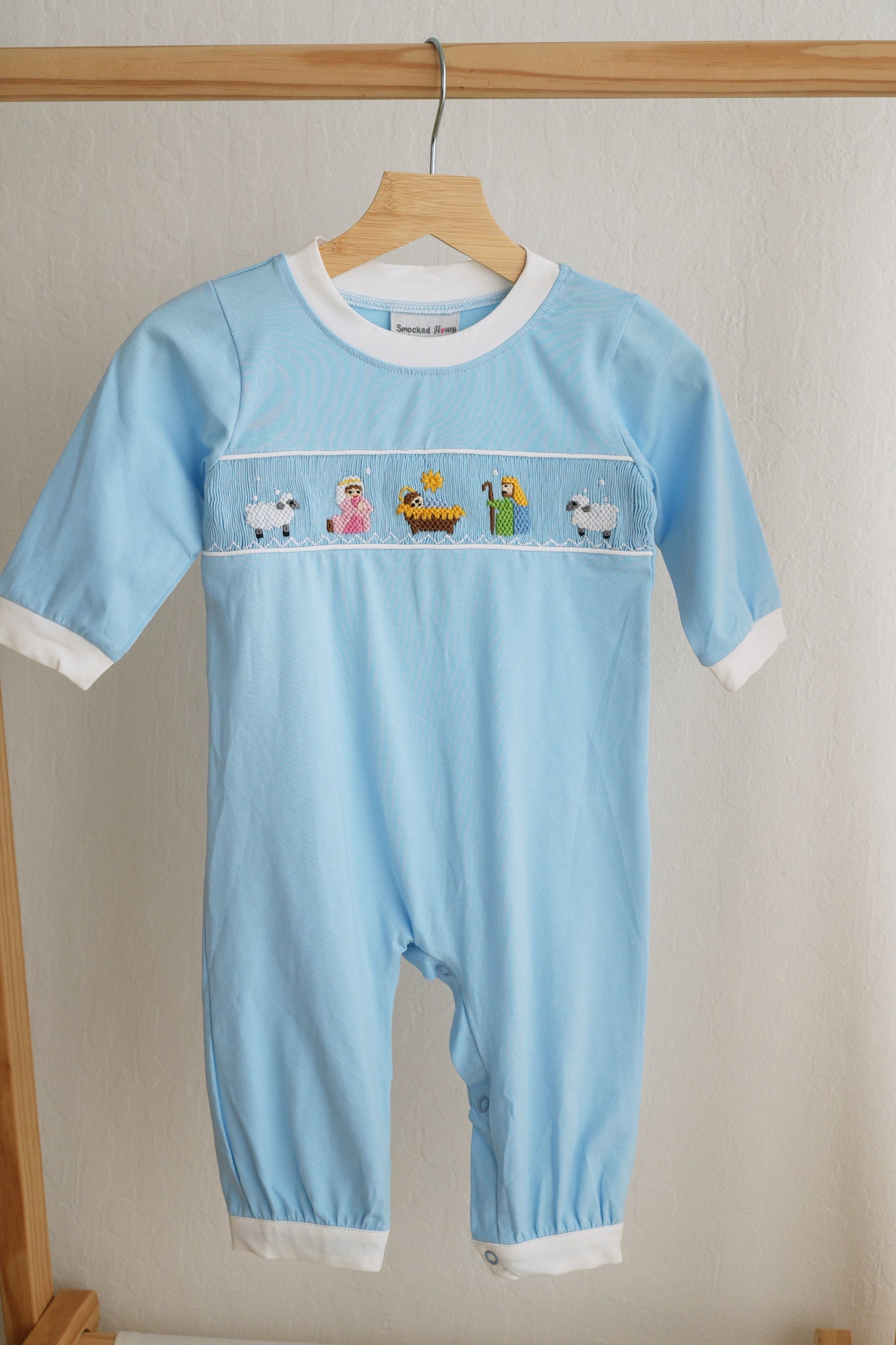 Blue nativity hand smocked romper