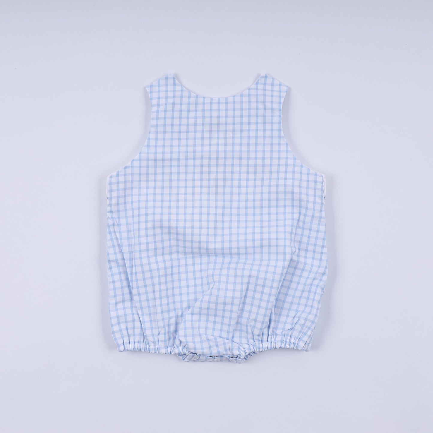 Blue character hand smocked gingham bubble